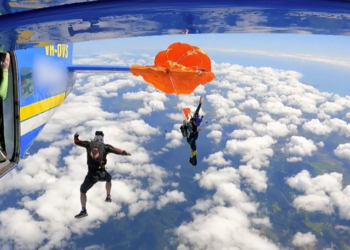 Australian skydiver’s parachute became caught on plane tail 15,000 feet in the air, video shows