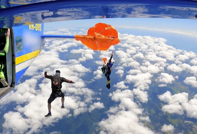 Australian skydiver’s parachute became caught on plane tail 15,000 feet in the air, video shows