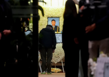 Kinder chocolate and tears: Hong Kong lays to rest ‘gentle’ firefighter killed battling inferno that rocked city